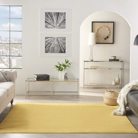 Nourison alfombra en porche, color amarillo aporta calidez y fácil limpieza