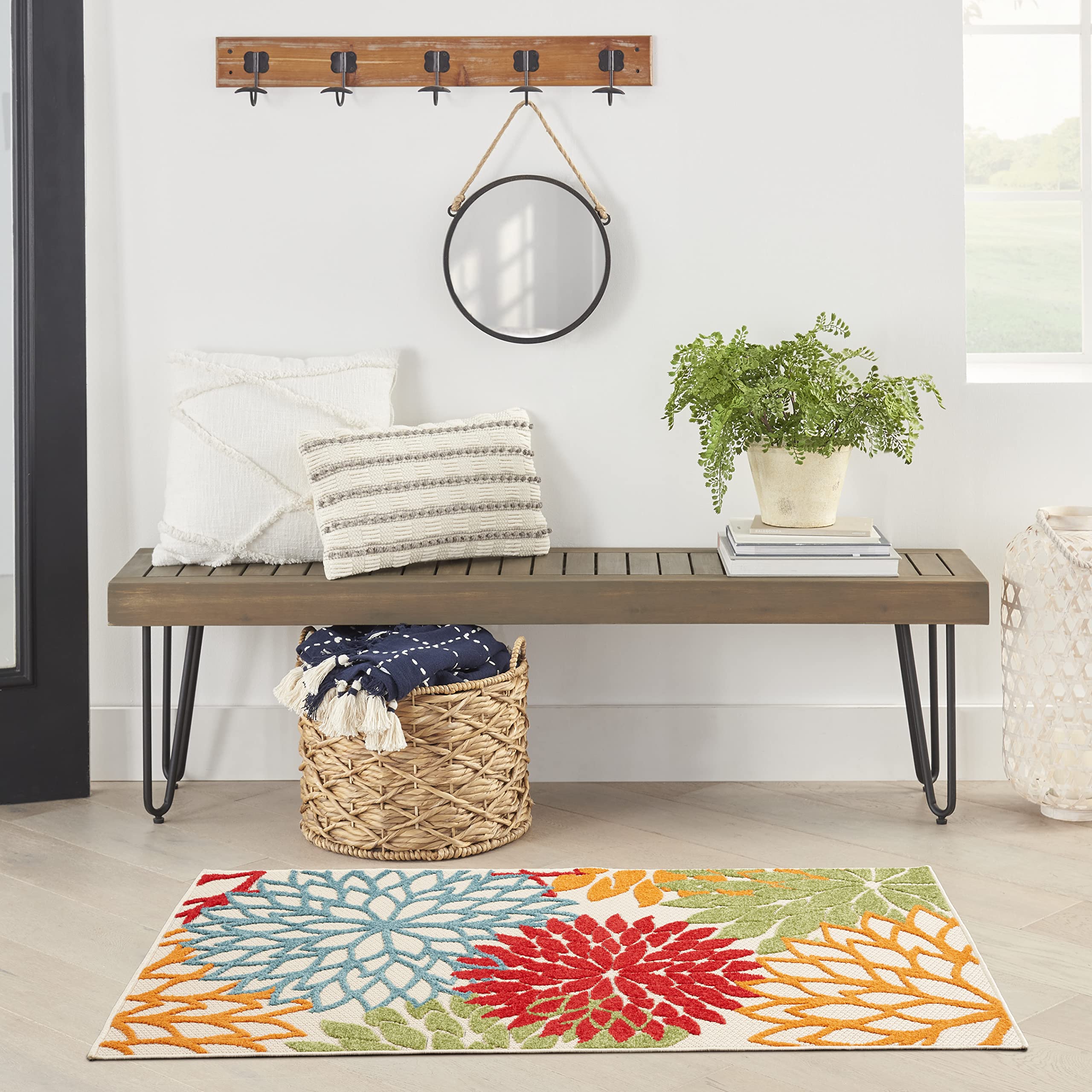 Nourison alfombra Aloha en patio usada con muebles exteriores, fácil limpieza