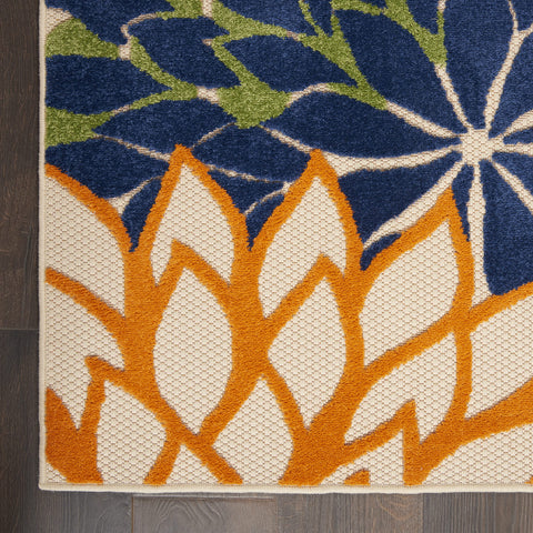 Nourison alfombra Aloha junto a muebles para apreciar escala real
