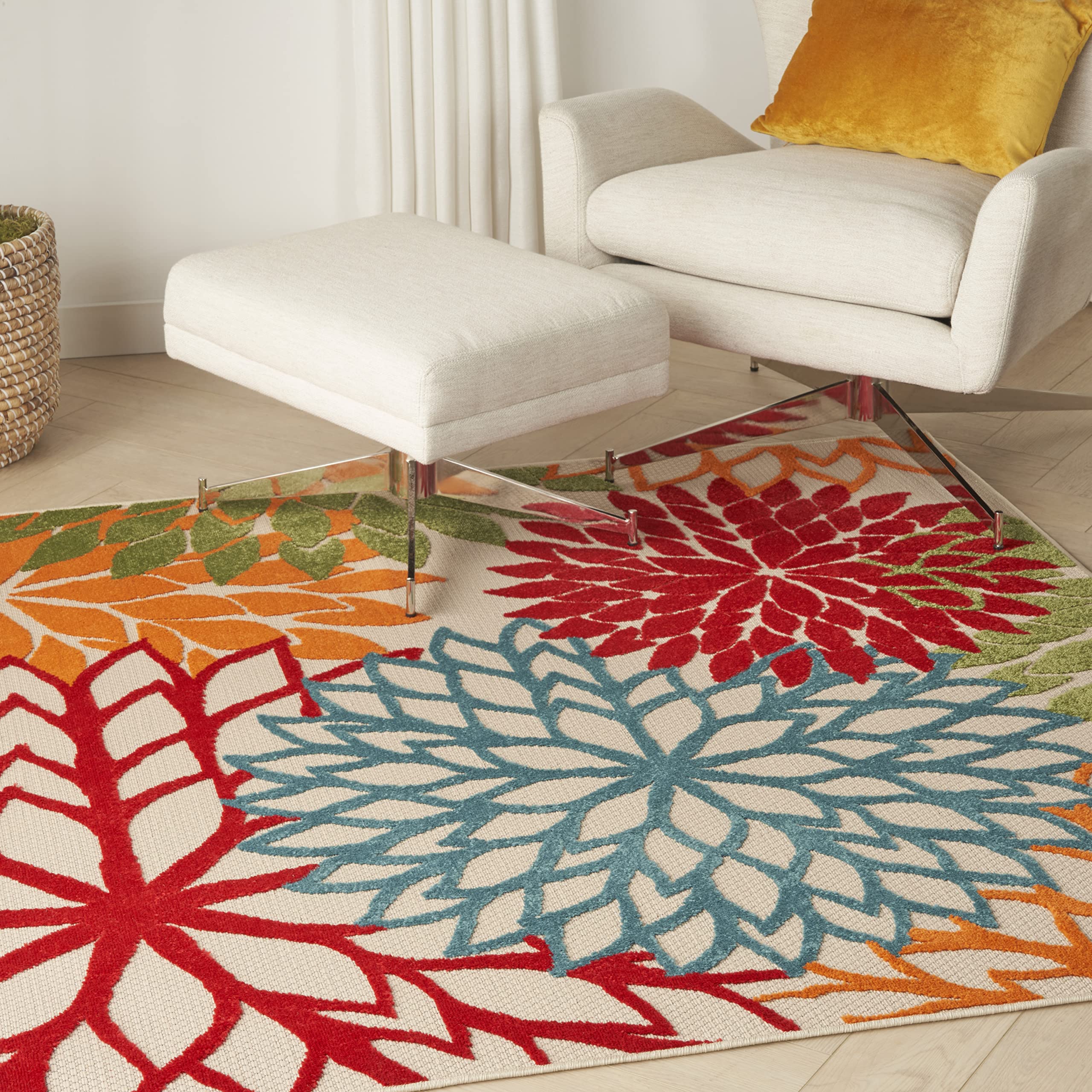 Nourison alfombra frontal verde mostrando diseño tropical y colores vivos
