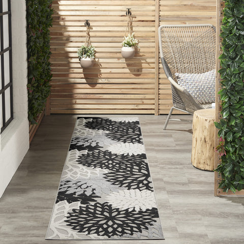 Nourison vista frontal de la alfombra Aloha, añade estilo instantáneo
