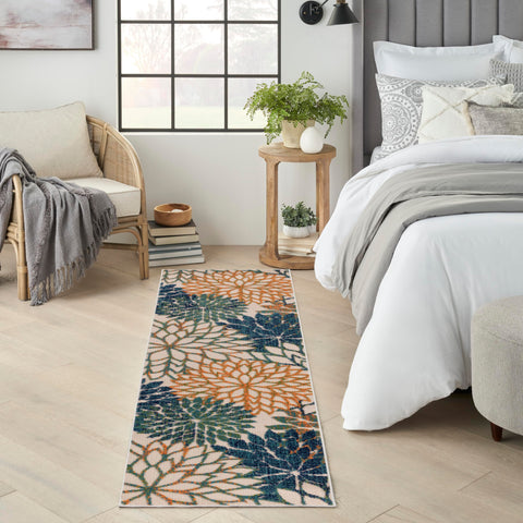 Nourison vista frontal de la alfombra Aloha, color y patrón llamativo
