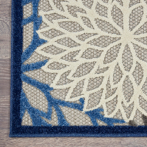 Nourison detalle del patrón floral amplio que embellece cualquier ambiente