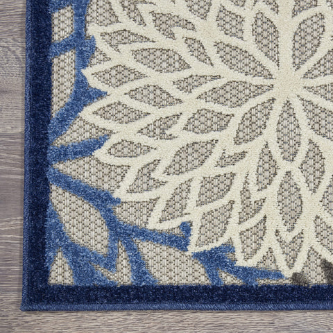 Nourison alfombra Aloha junto a muebles, integra diseño con funcionalidad diaria