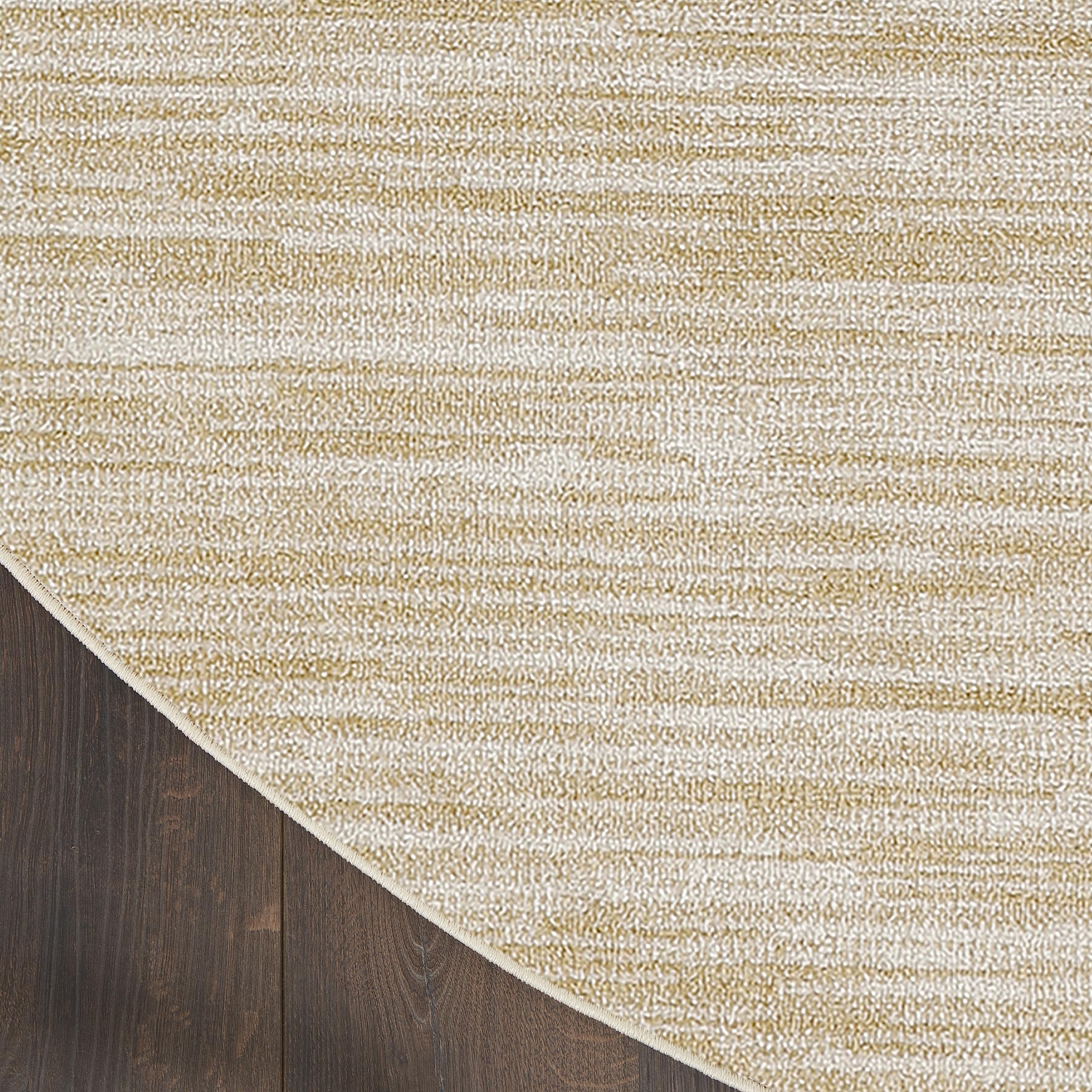 Nourison etiqueta y borde mostrando material 100% polipropileno duradero