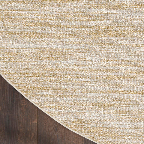 Nourison etiqueta y borde mostrando material 100% polipropileno duradero