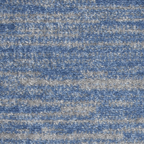 Nourison alfombra junto a piscina, material apto para exteriores