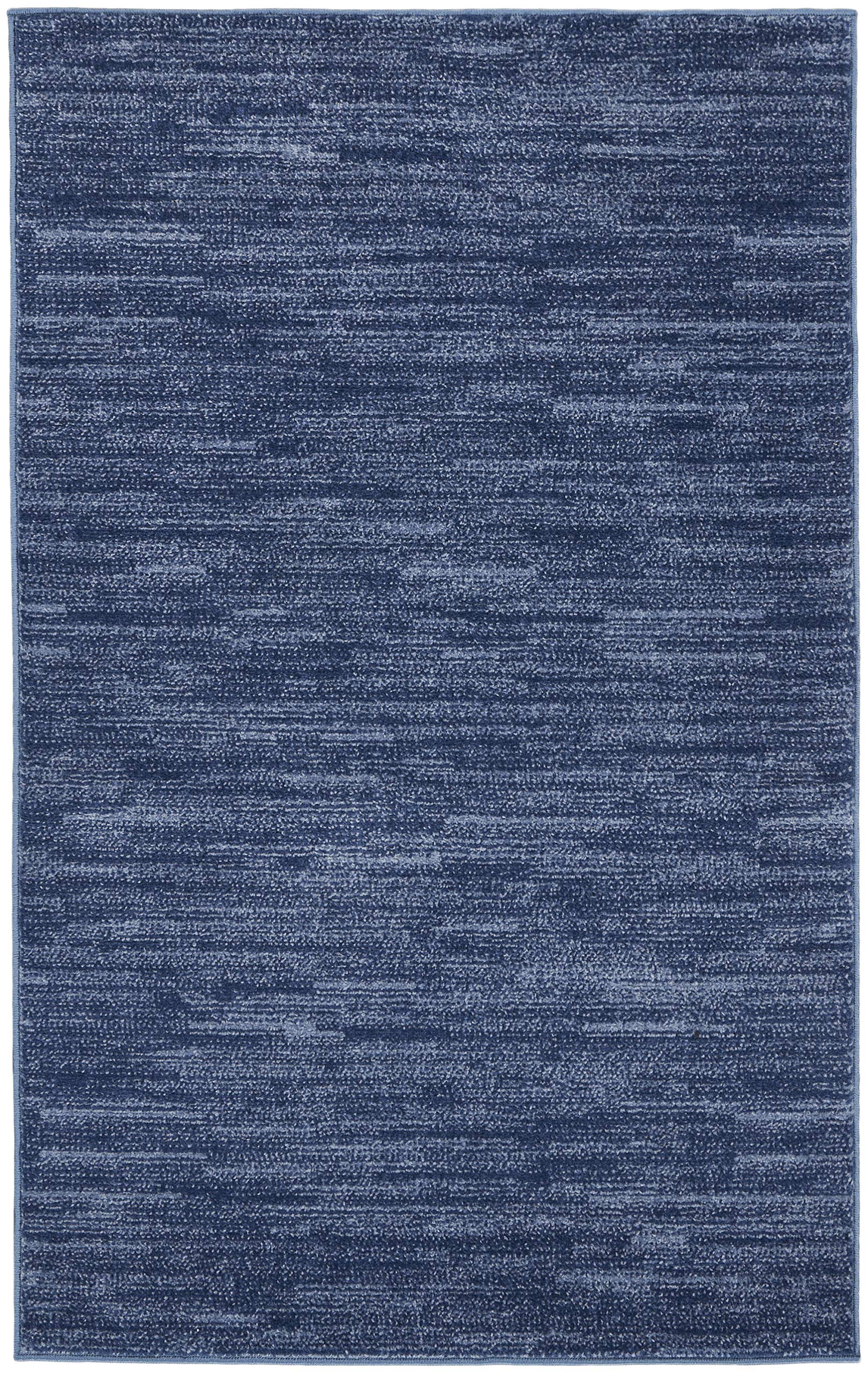 Nourison alfombra 3x5 tamaño real comparada con muebles cercanos