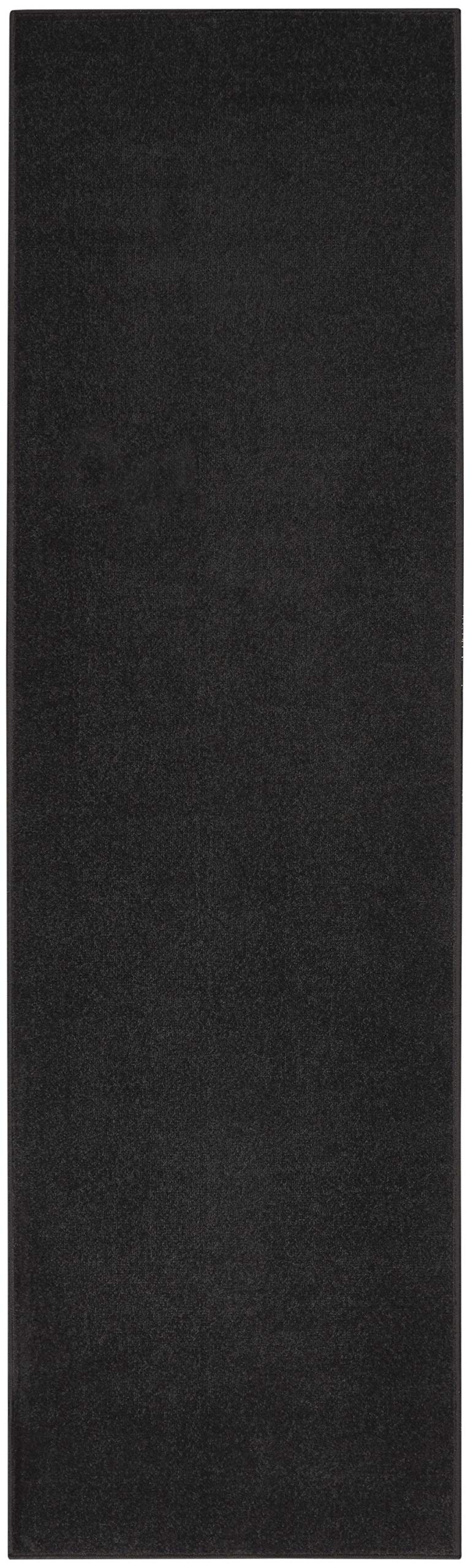 Nourison alfombra colocada en deck exterior, aspecto limpio y práctico