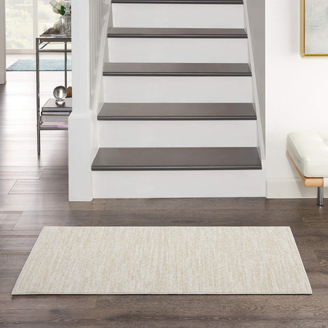 Nourison vista frontal de la alfombra 2'x4' mostrando color ivory beige y diseño neutro