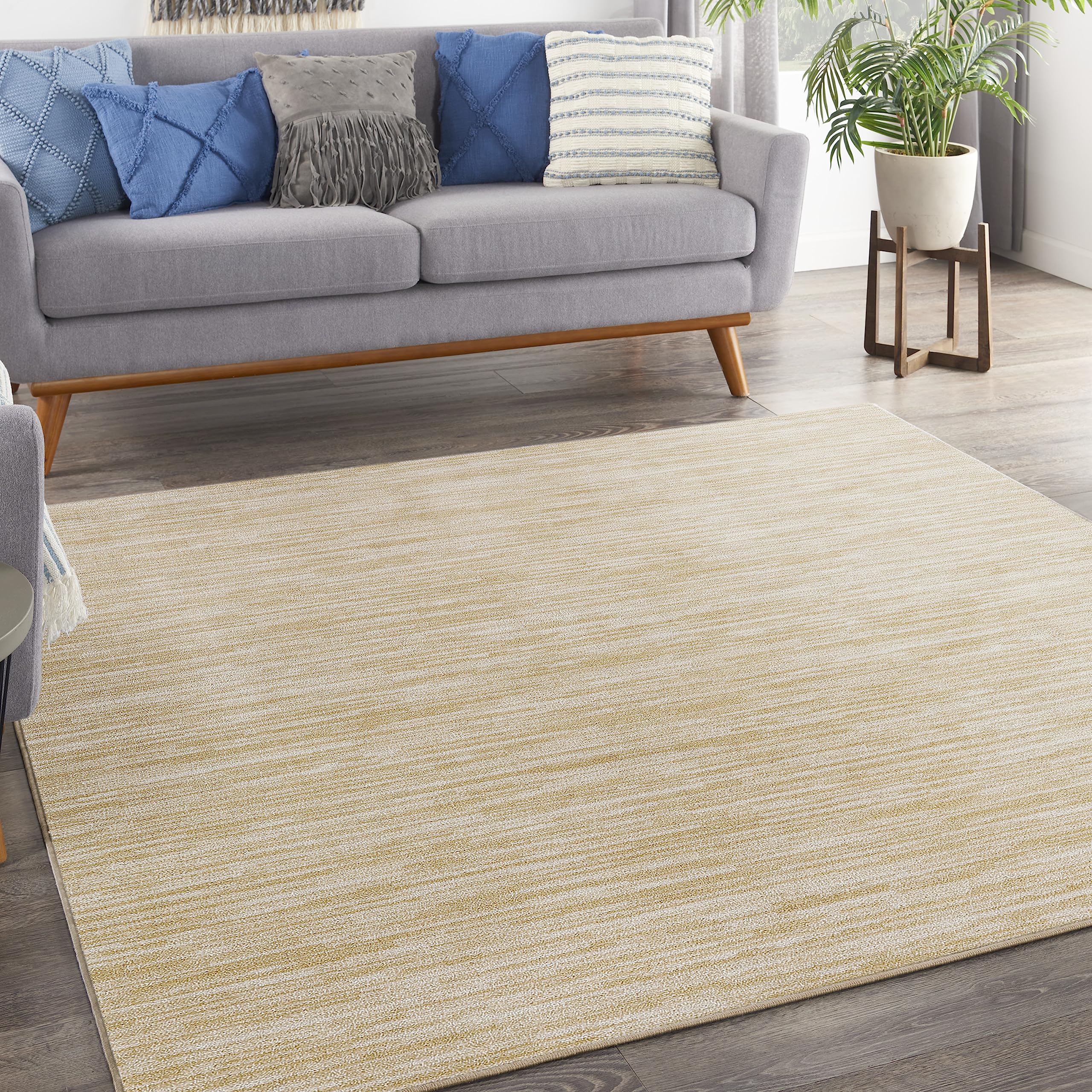 Nourison alfombra frontal mostrando color marfil y dorado, versatilidad estética