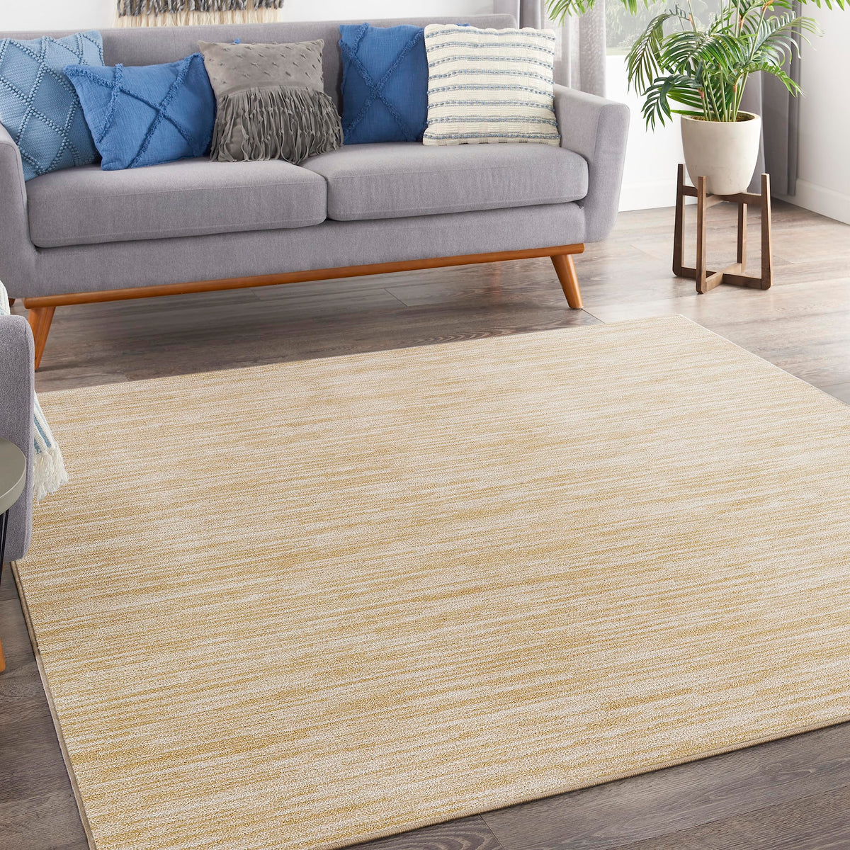 Nourison alfombra frontal mostrando color marfil y dorado, versatilidad estética