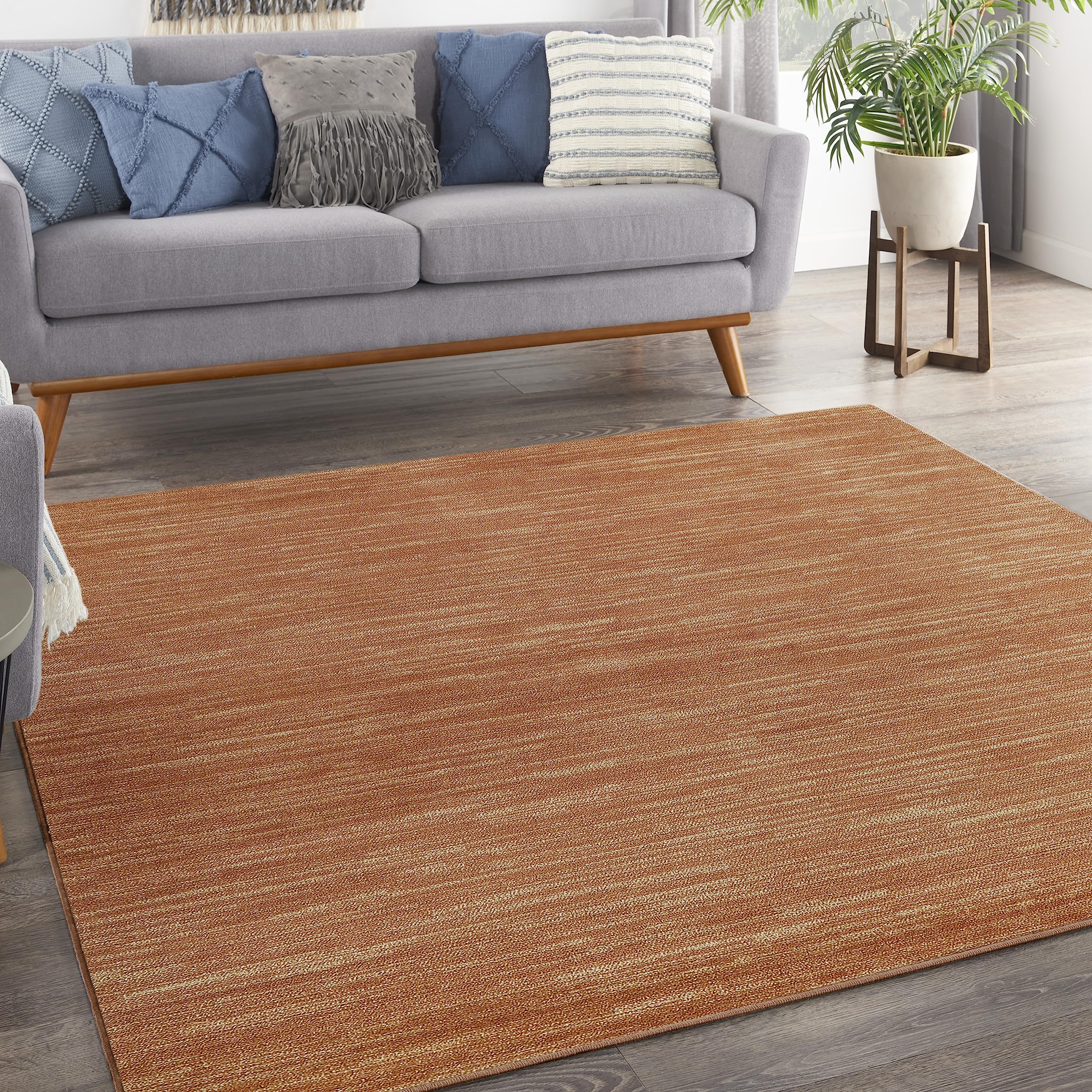 Nourison alfombra frontal mostrando color óxido y borde nítido, aspecto duradero