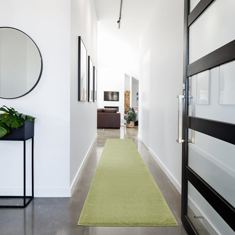 Nourison alfombra frontal verde muestra diseño y color duradero