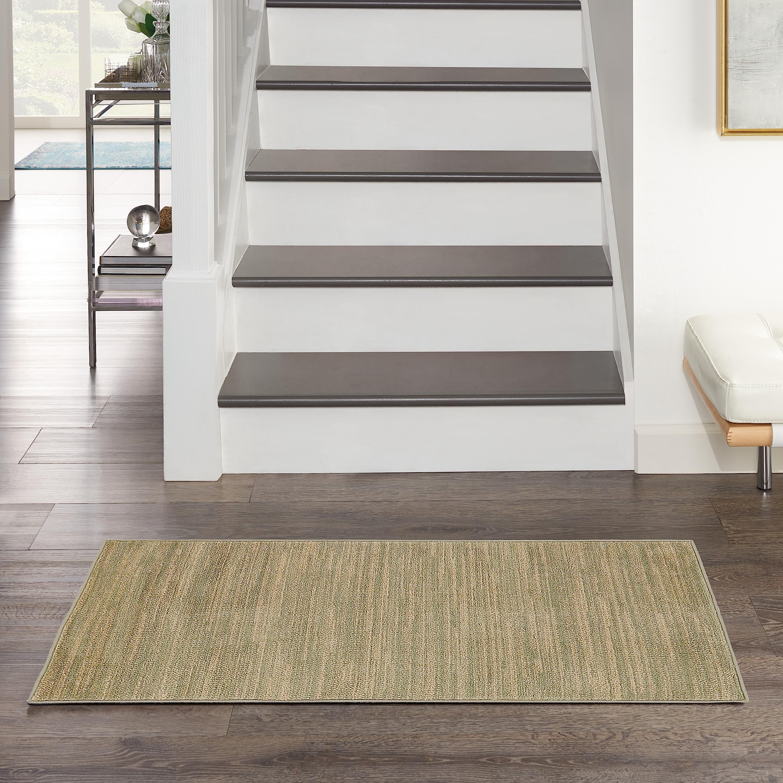Nourison vista frontal de la alfombra verde dorado aporta elegancia y durabilidad