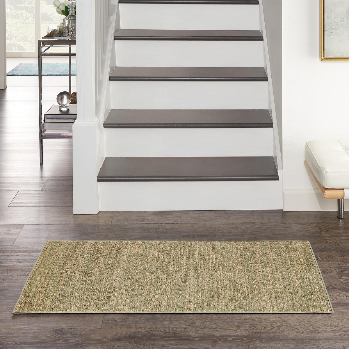 Nourison vista frontal de la alfombra verde dorado aporta elegancia y durabilidad