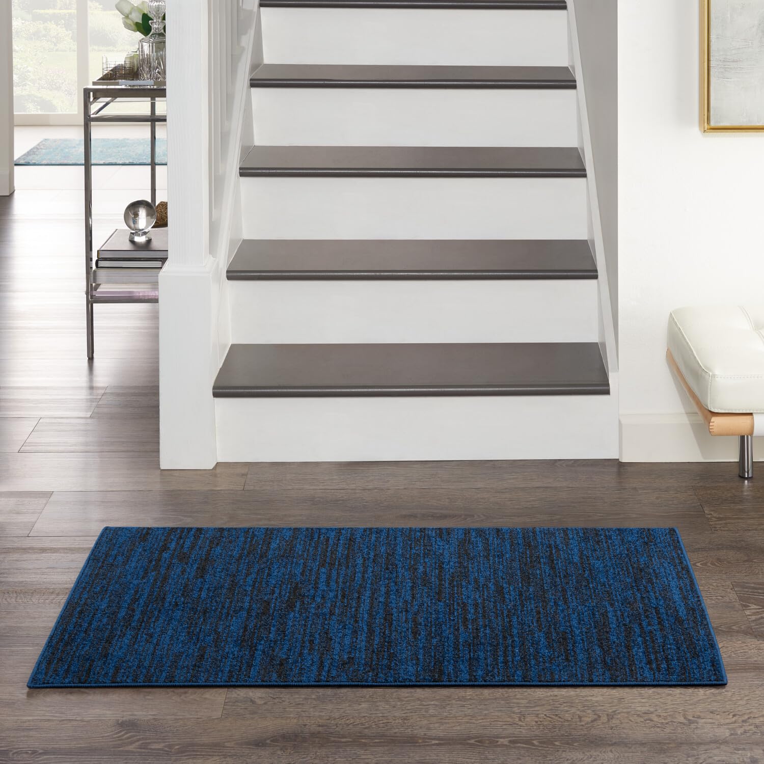 Nourison detalle de textura de polipropileno mostrando tacto suave y fácil limpieza