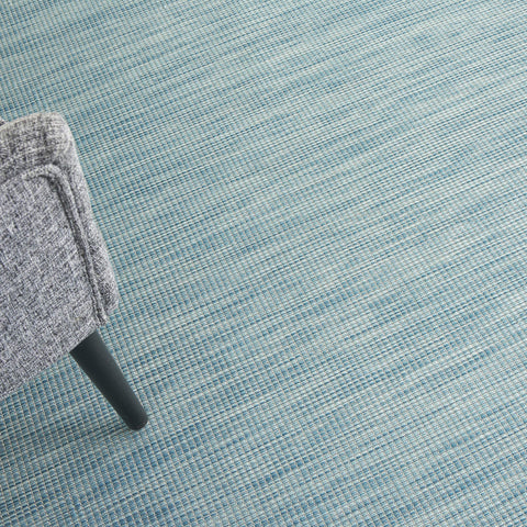 Nourison Positano Aqua primer plano de textura que resalta resistencia y tacto