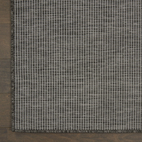 Nourison comparación de tamaño 5' x 7' para ver escala en habitación