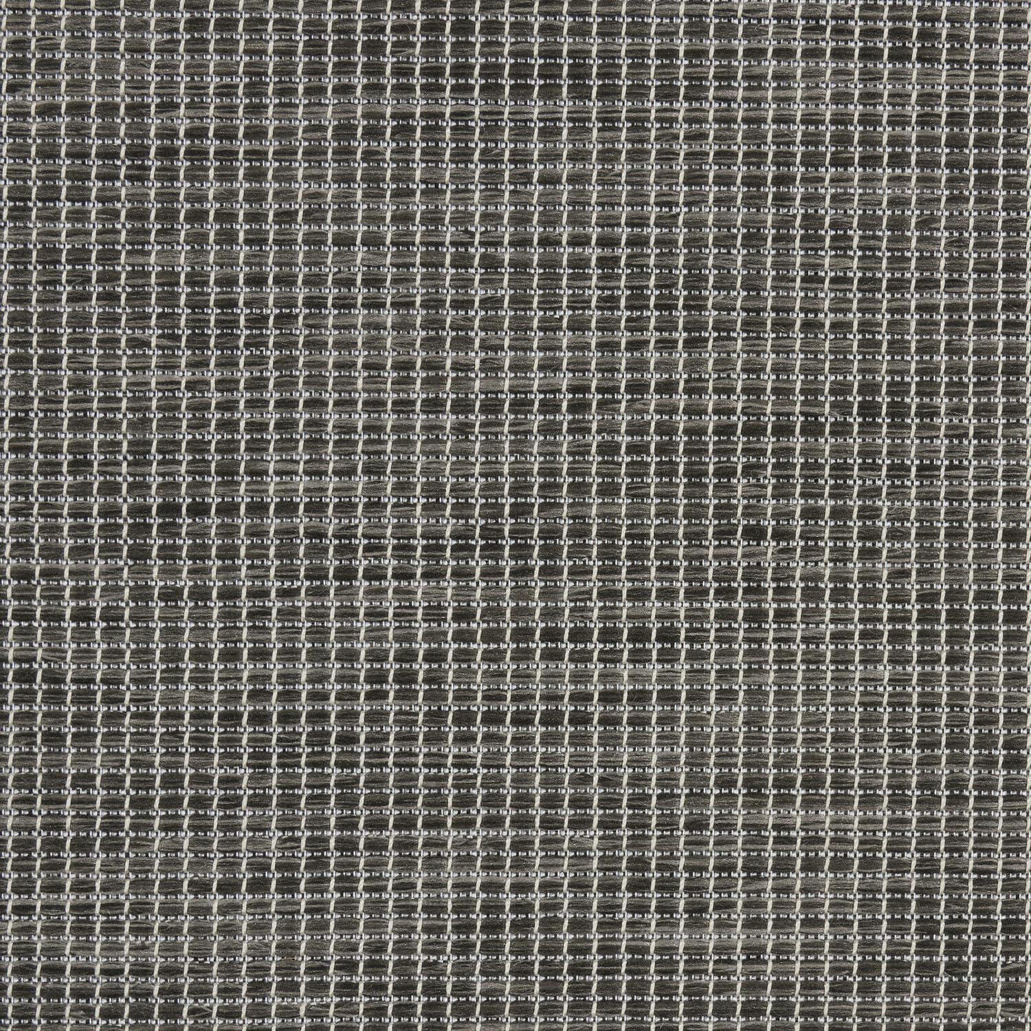 Nourison alfombra junto a una silla para mostrar escala y ajuste
