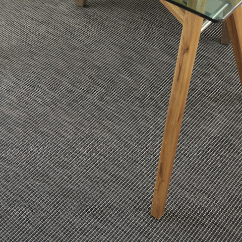 Nourison detalle de textura cerca mostrando durabilidad y apariencia elegante