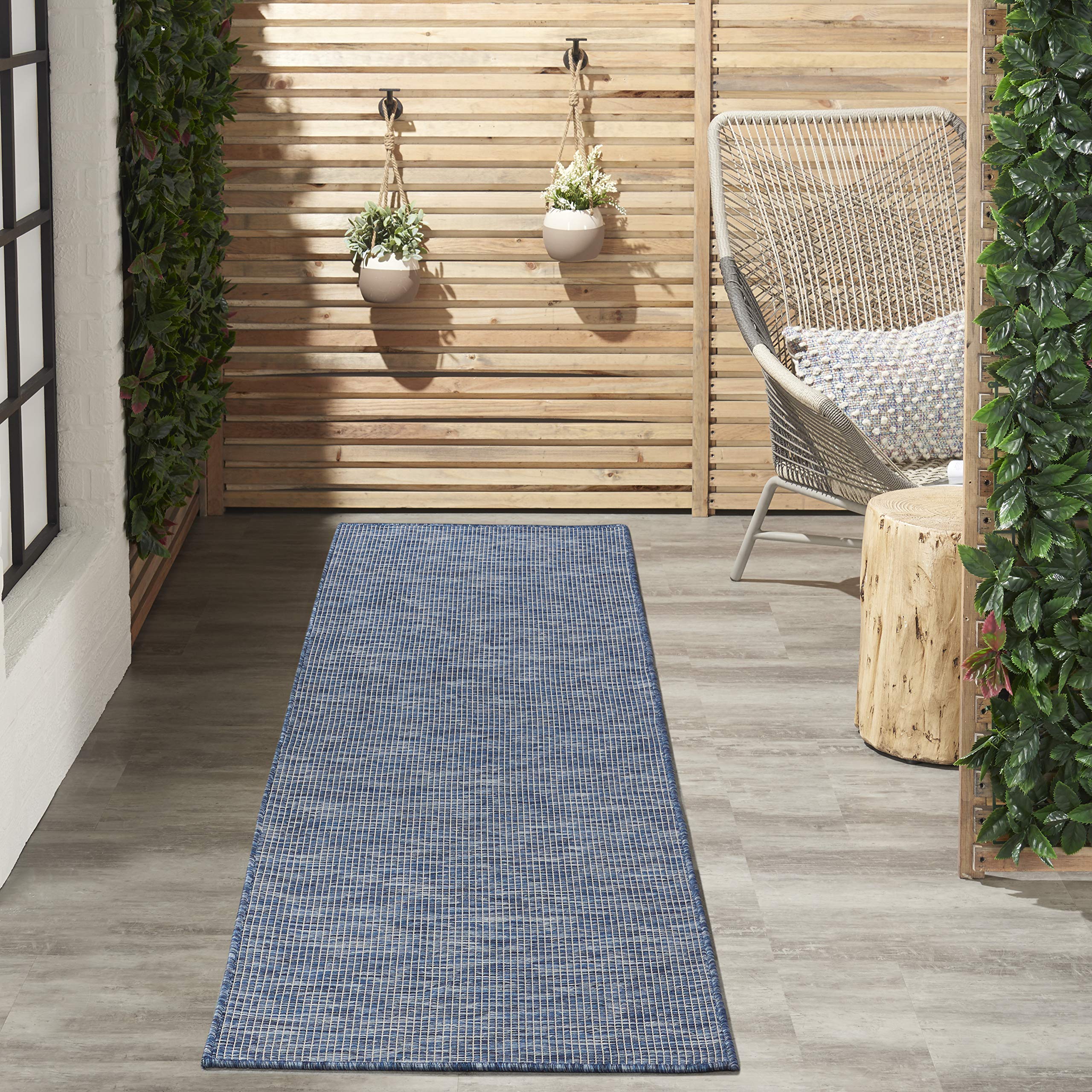 Nourison Positano detalle de fibra resistente ideal para enjuague con manguera