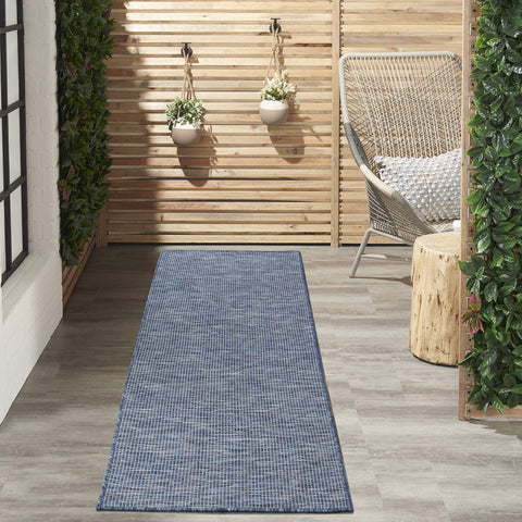 Nourison Positano detalle de fibra resistente ideal para enjuague con manguera