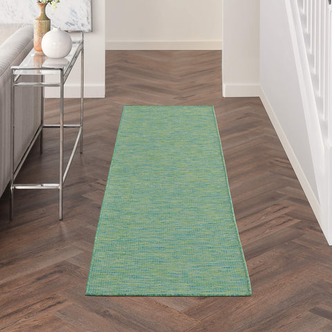 Nourison runner frontal mostrando tonos azul y verde y durabilidad