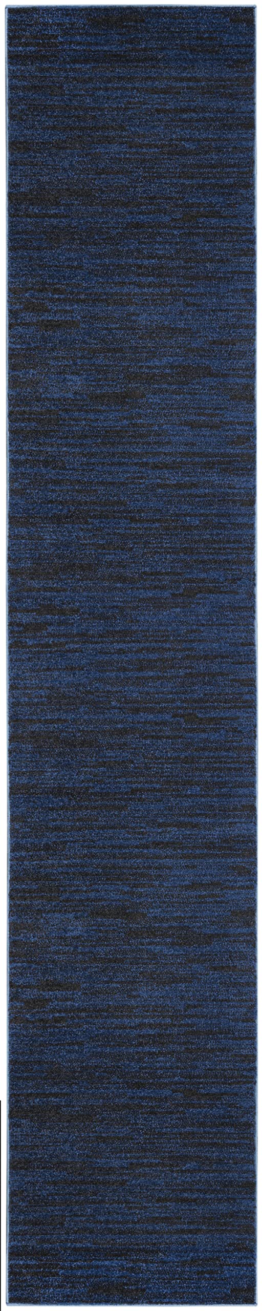 Nourison alfombra en pasillo ilustrando uso cotidiano y durabilidad