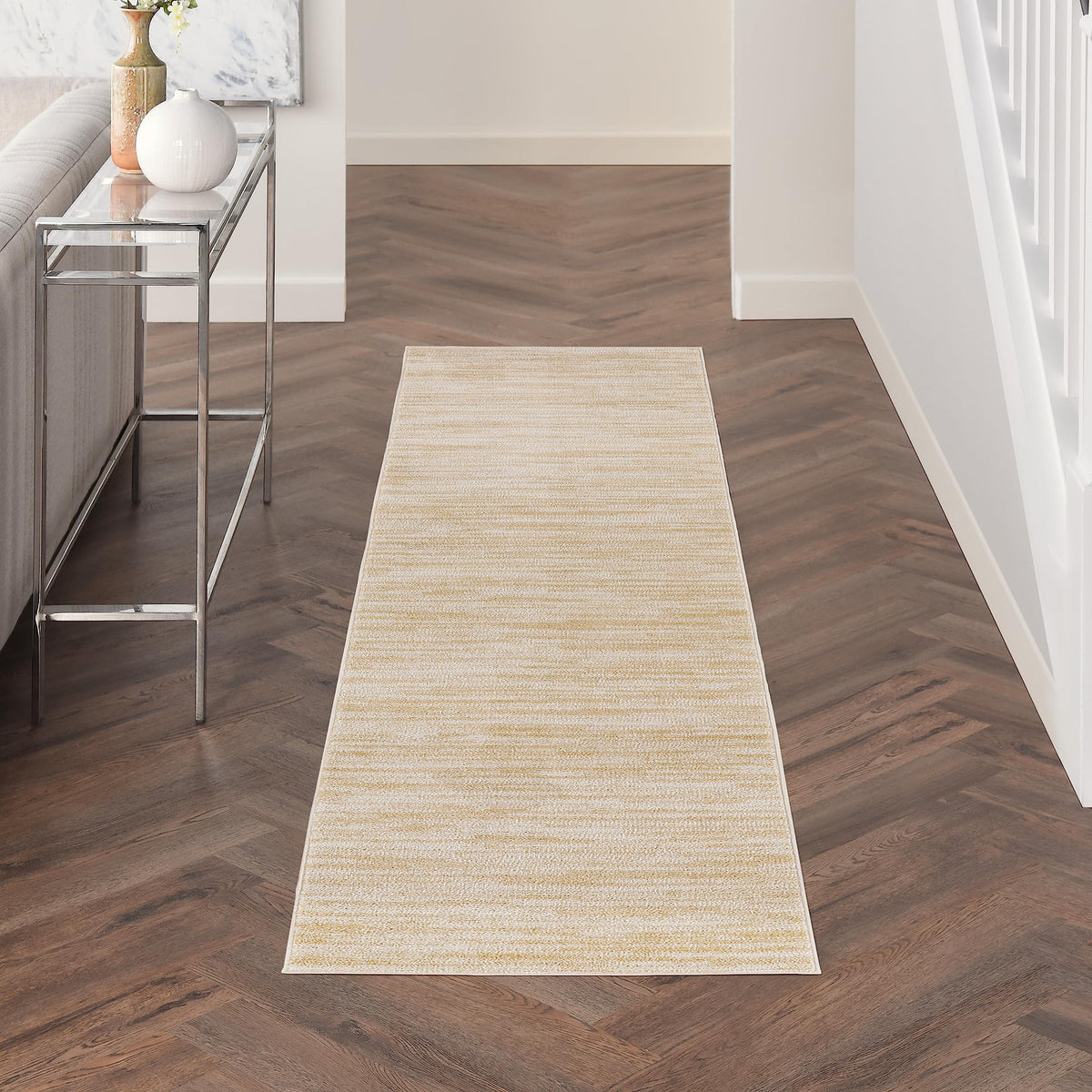 Nourison vista frontal del runner mostrando color ivory gold y beneficio de elegancia práctica