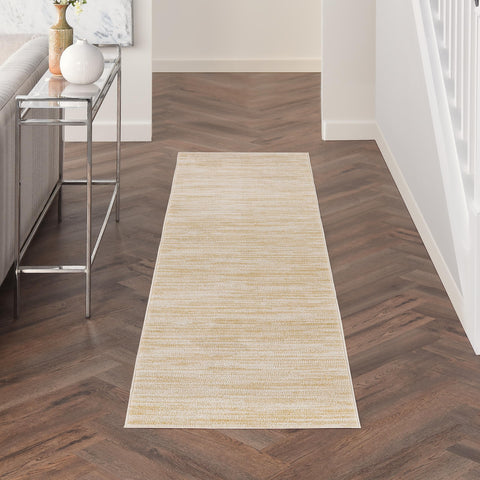 Nourison vista frontal del runner mostrando color ivory gold y beneficio de elegancia práctica