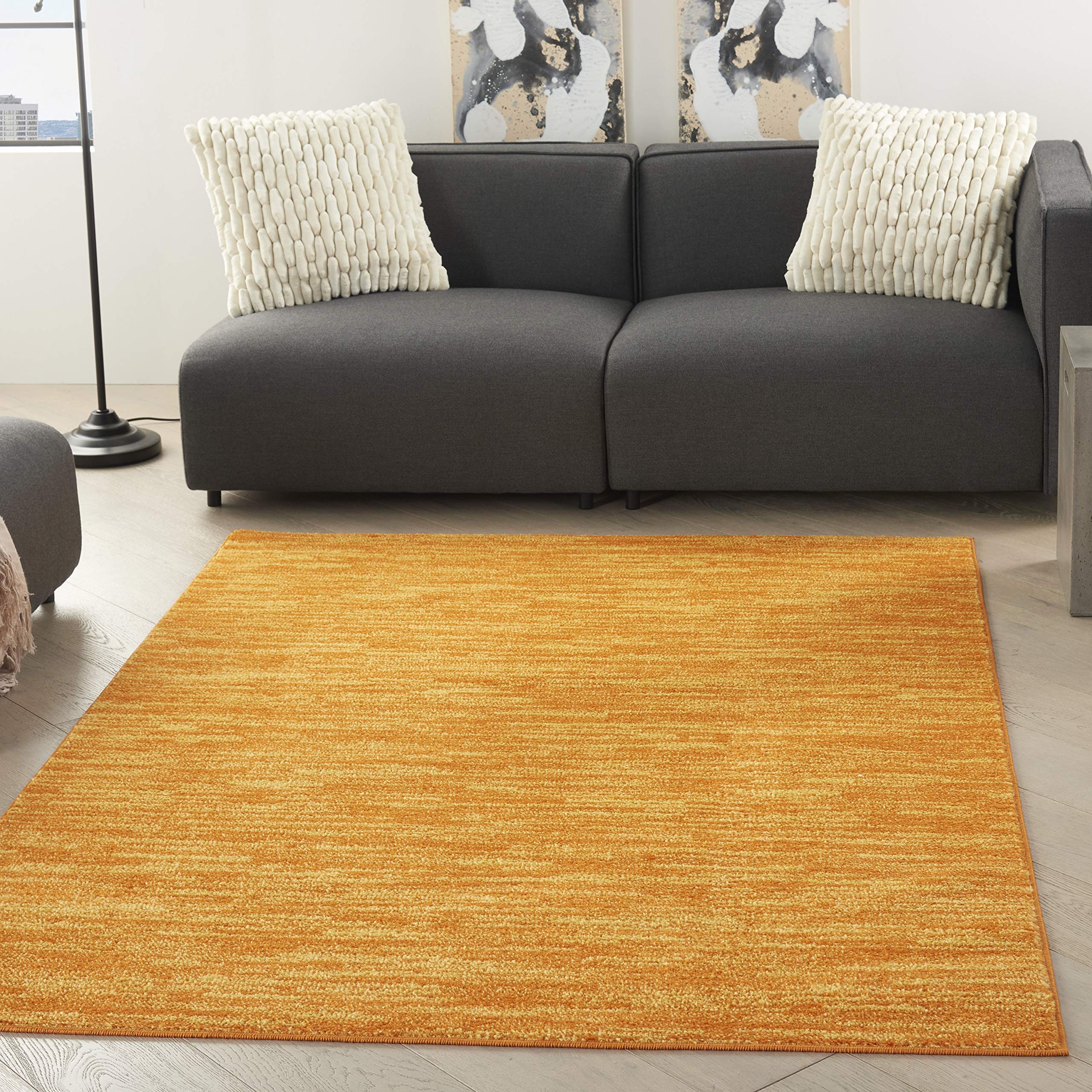 Nourison vista frontal de la alfombra Sunburst mostrando color y forma, aporta energía visual