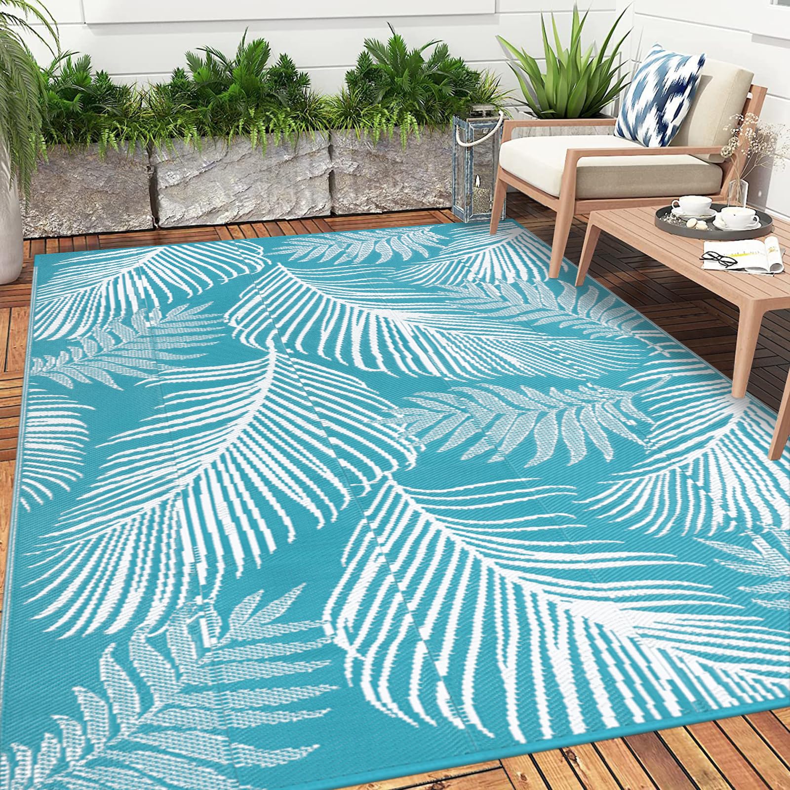 Pauwer alfombra en terraza con plantas para ambiente acogedor