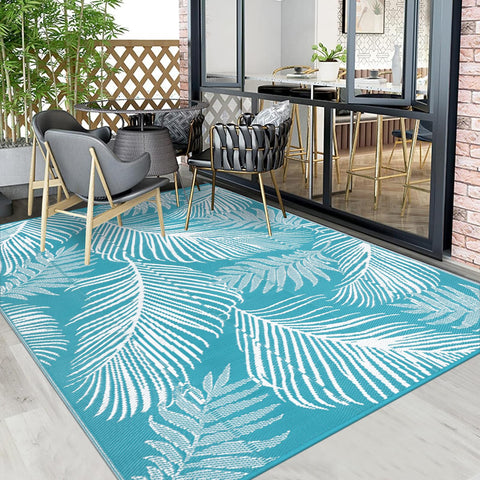 Pauwer alfombra 8x10 junto a muebles para comparar escala