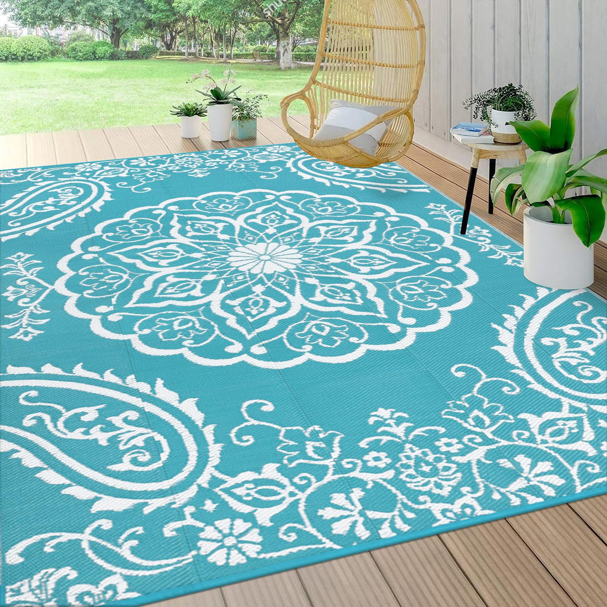 Pauwer alfombra exterior frontal mostrando diseño boho teal y resistencia