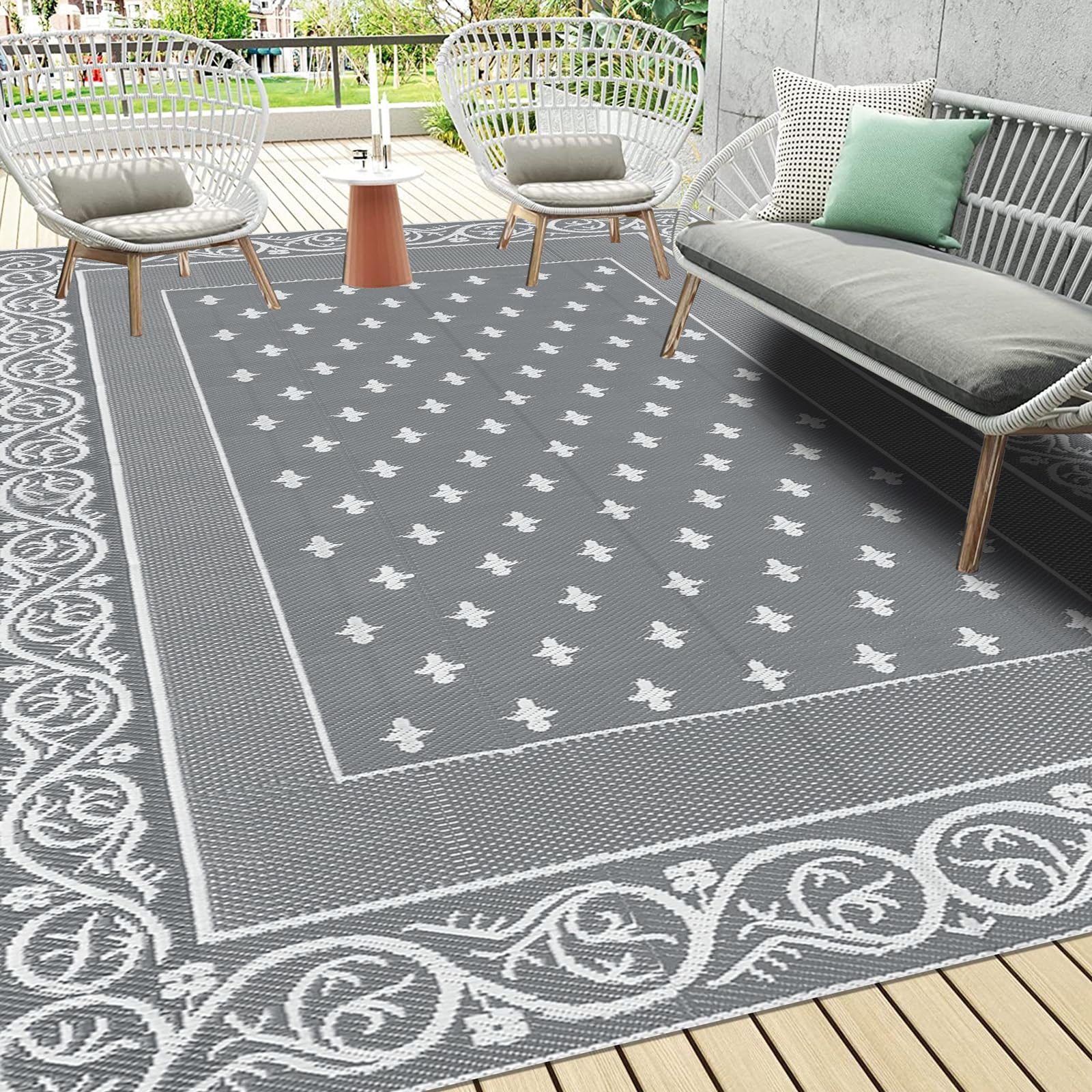 Pauwer alfombra exterior frontal mostrando diseño gris y borde, aporta estilo duradero