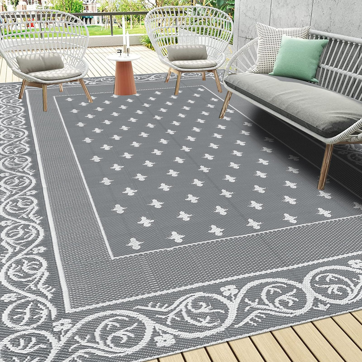 Pauwer alfombra exterior frontal mostrando diseño gris y borde, aporta estilo duradero