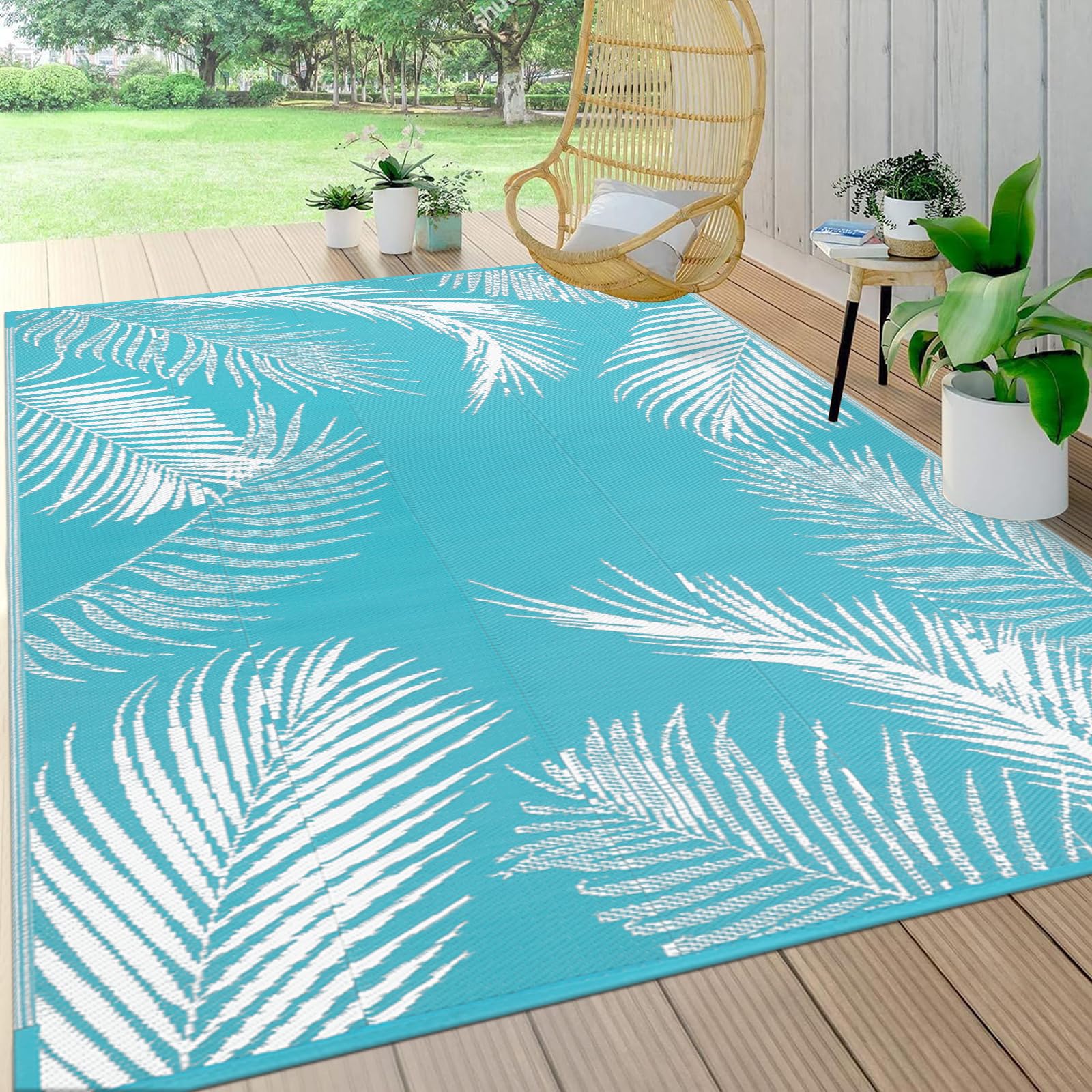 Pauwer alfombra frontal mostrando diseño de hojas teal y protección decorativa