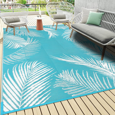 Pauwer alfombra frontal mostrando el estampado hoja teal y protección decorativa