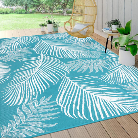 Pauwer alfombra exterior frontal muestra patrón hoja teal y decoración
