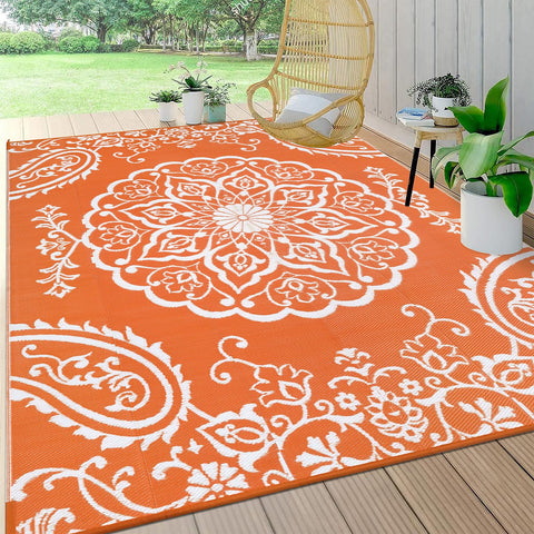 Pauwer vista frontal de la alfombra boho naranja mostrando patrón y tamaño