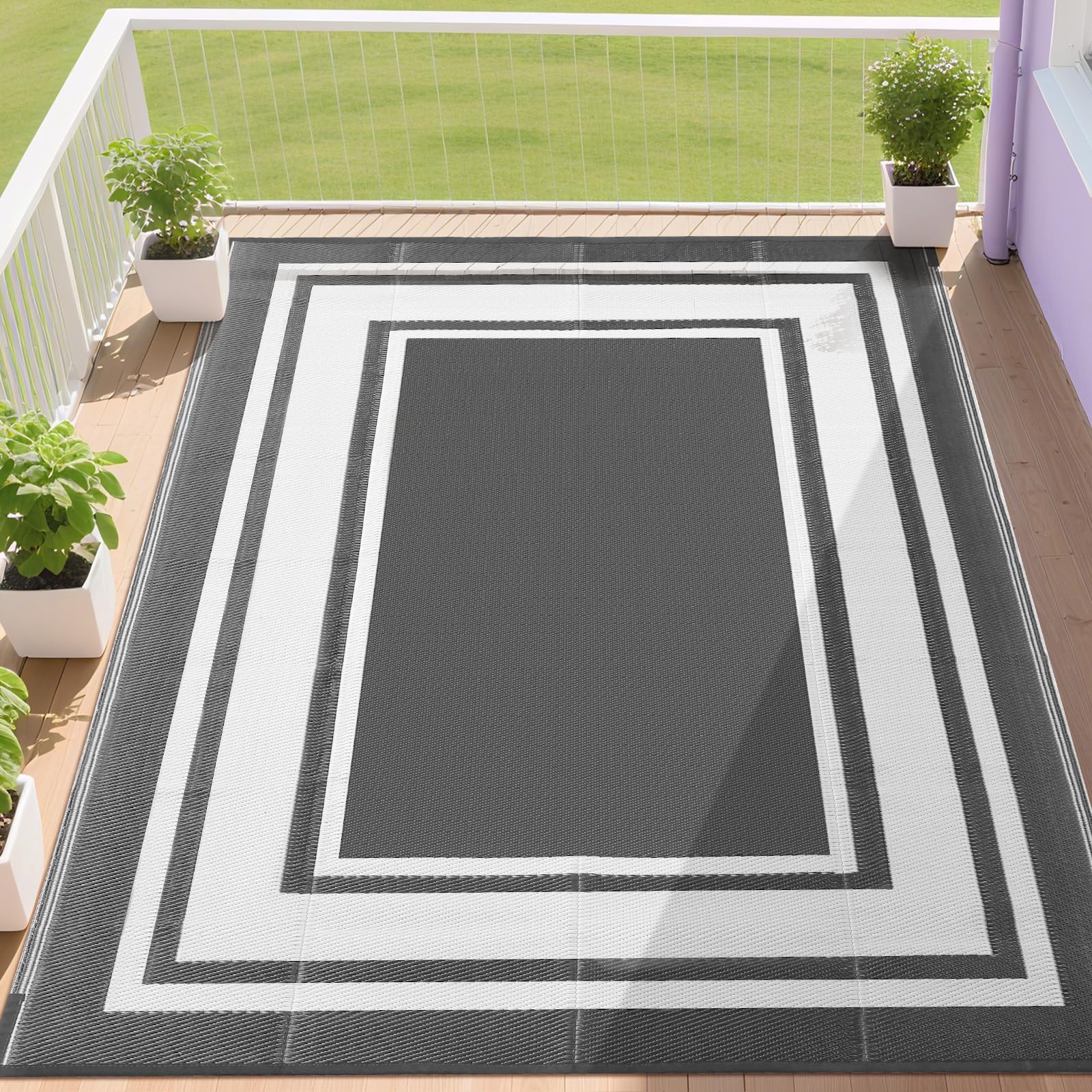 RURALITY vista frontal de la alfombra exterior mostrando diseño gris y blanco y protección