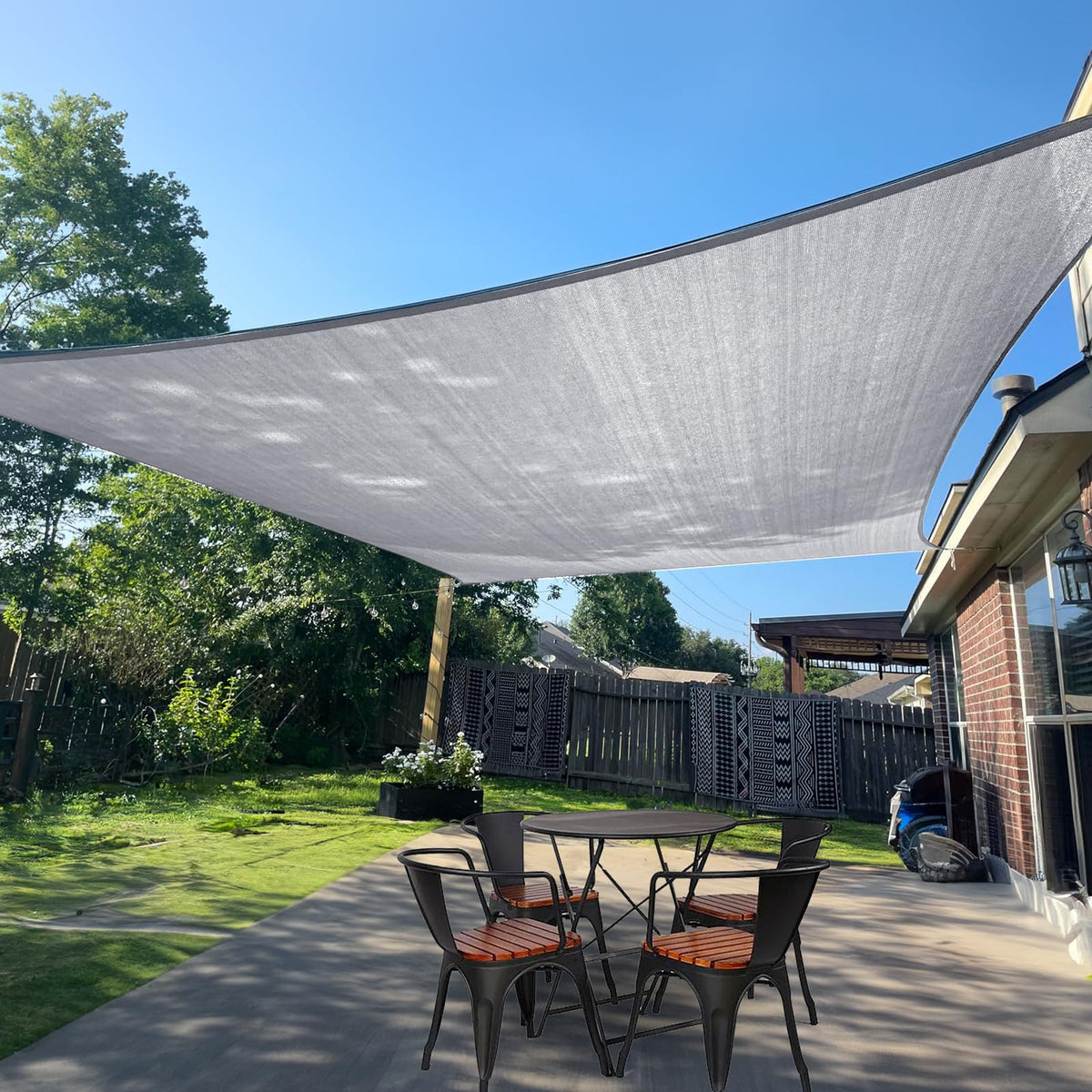 SUNLAX toldo rectangular frontal mostrando cobertura y estilo