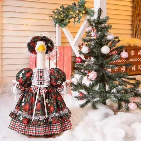 Suzile ganso vestido colocado en jardín dando ambiente navideño alegre