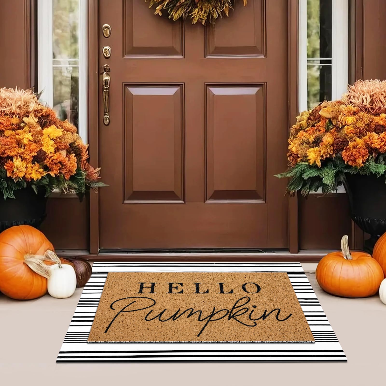 Tinideya detalle del felpudo con calabaza mostrando claridad del estampado y bienvenida
