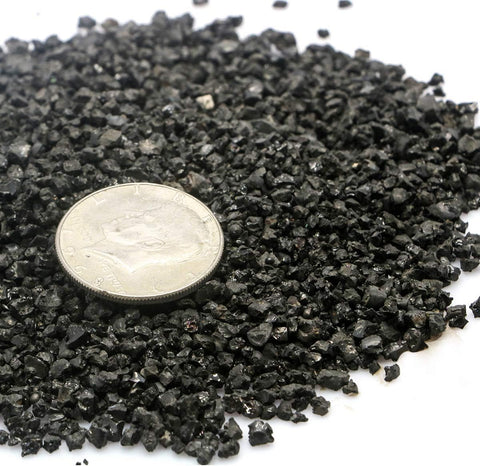 TOYPOPOR textura de piedras negras demostrando brillo y uniformidad