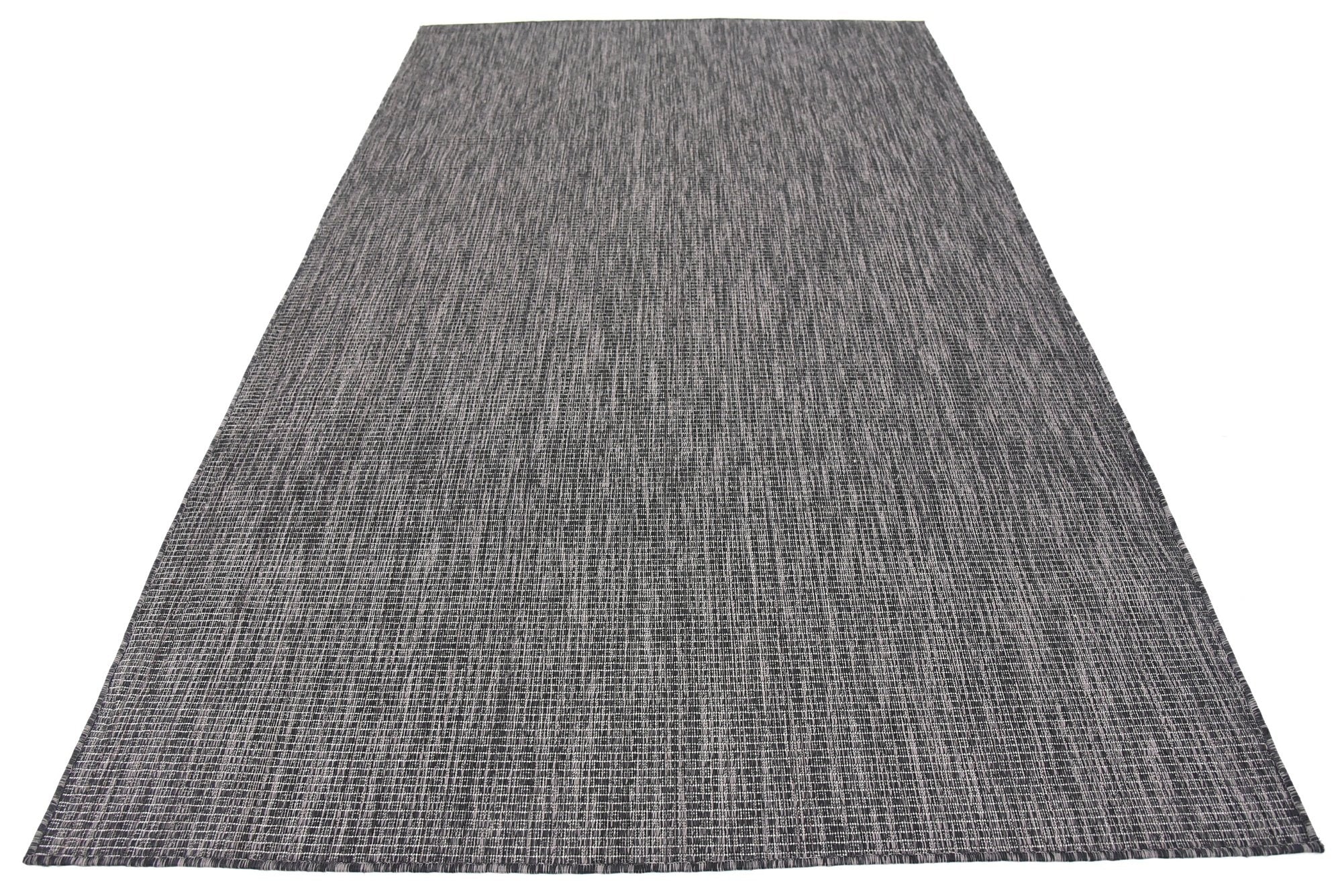 Unique Loom esquina junto a mesa mostrando combinación con muebles