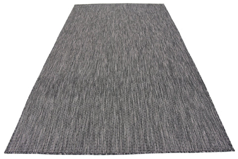 Unique Loom esquina junto a mesa mostrando combinación con muebles