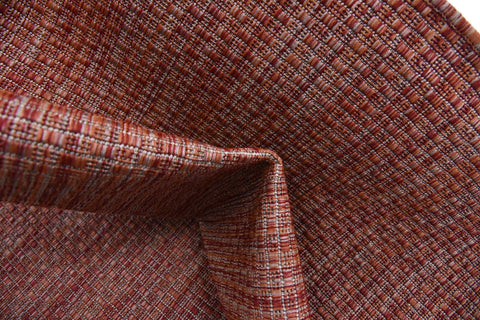 Unique Loom alfombra recién desempaquetada con pliegues que se aplanan con el tiempo