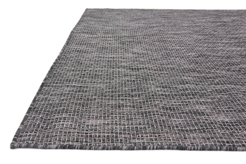 Unique Loom detalle del respaldo que ofrece estabilidad antideslizante